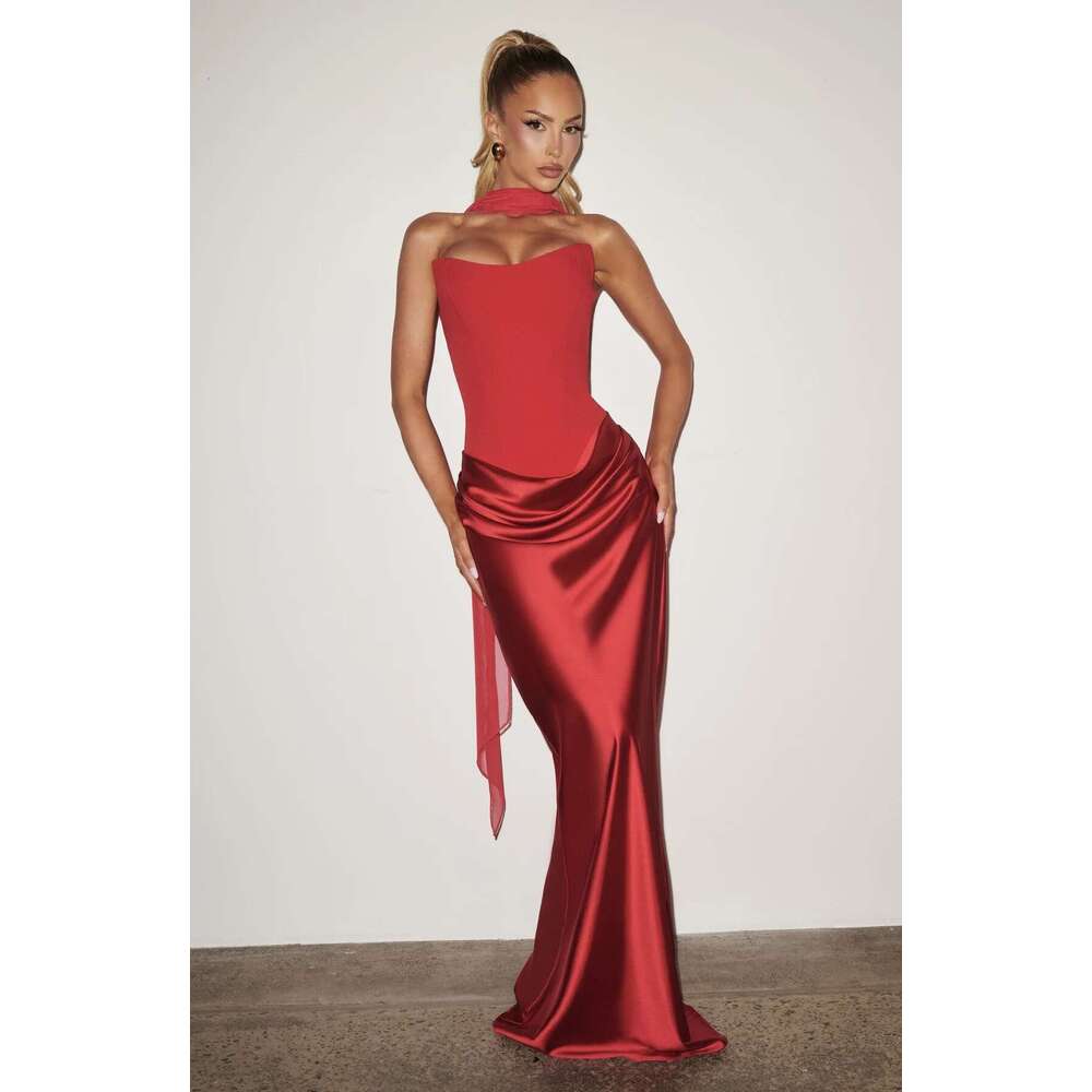 Spring 2026 Women's Collection: Seductive fishbone strapless dress with a cinched waist, adorned with ribbons and a satin pencil skirt.