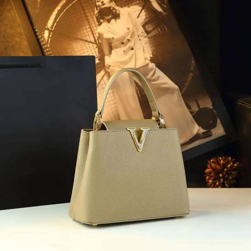 Popular High-Grade Leather Women Handbags Small Portable Bucket Bag 2025 New Niche Design Commuter Crossbody Mother Bags