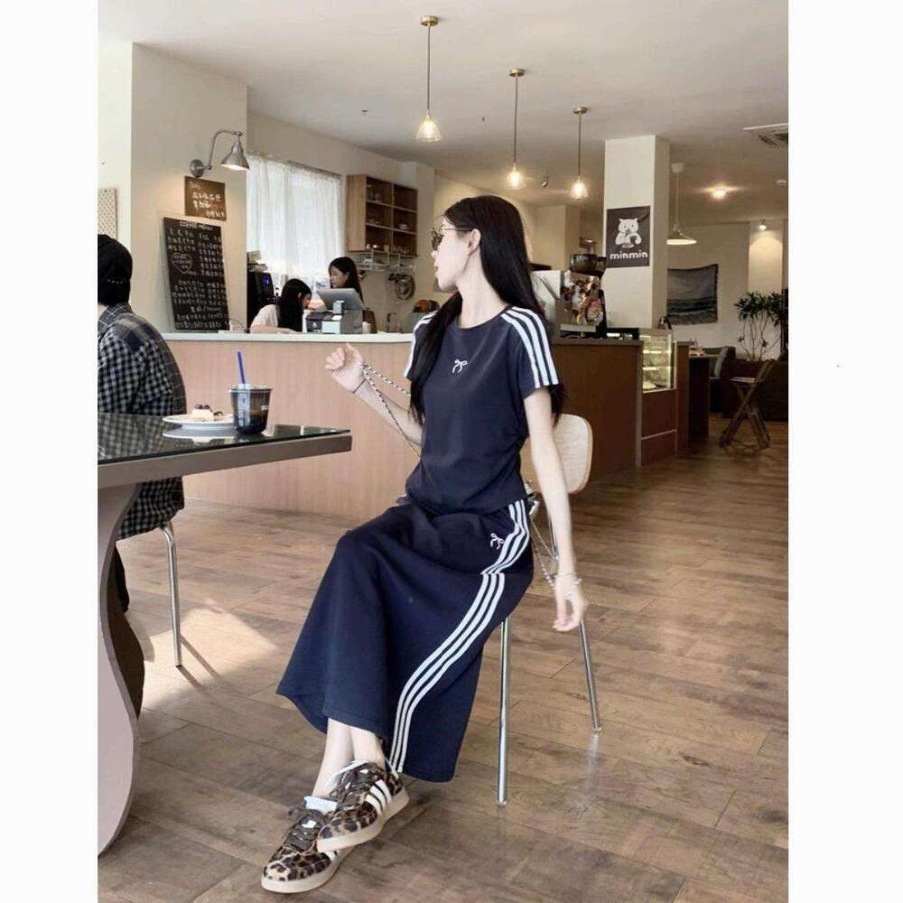 Casual Sports Set Women's Bow Short Sleeved T-shirt Spring and Summer Hip Hugging Half Length Skirt Two Piece Set