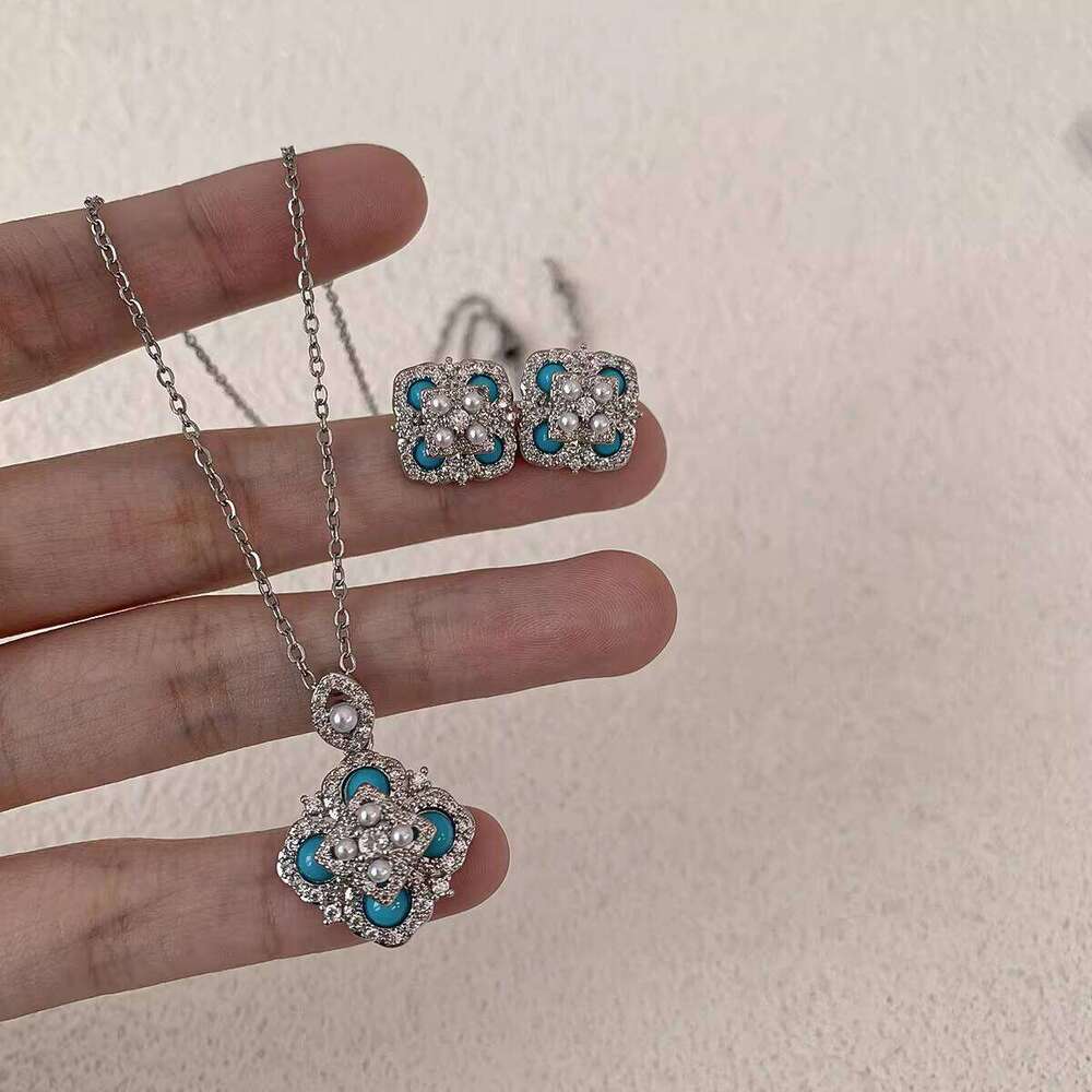 Exquisite micro-inlaid zircon turquoise four-leaf flower pearl earrings and necklace for women, fashionable niche light luxury elegant jewelry