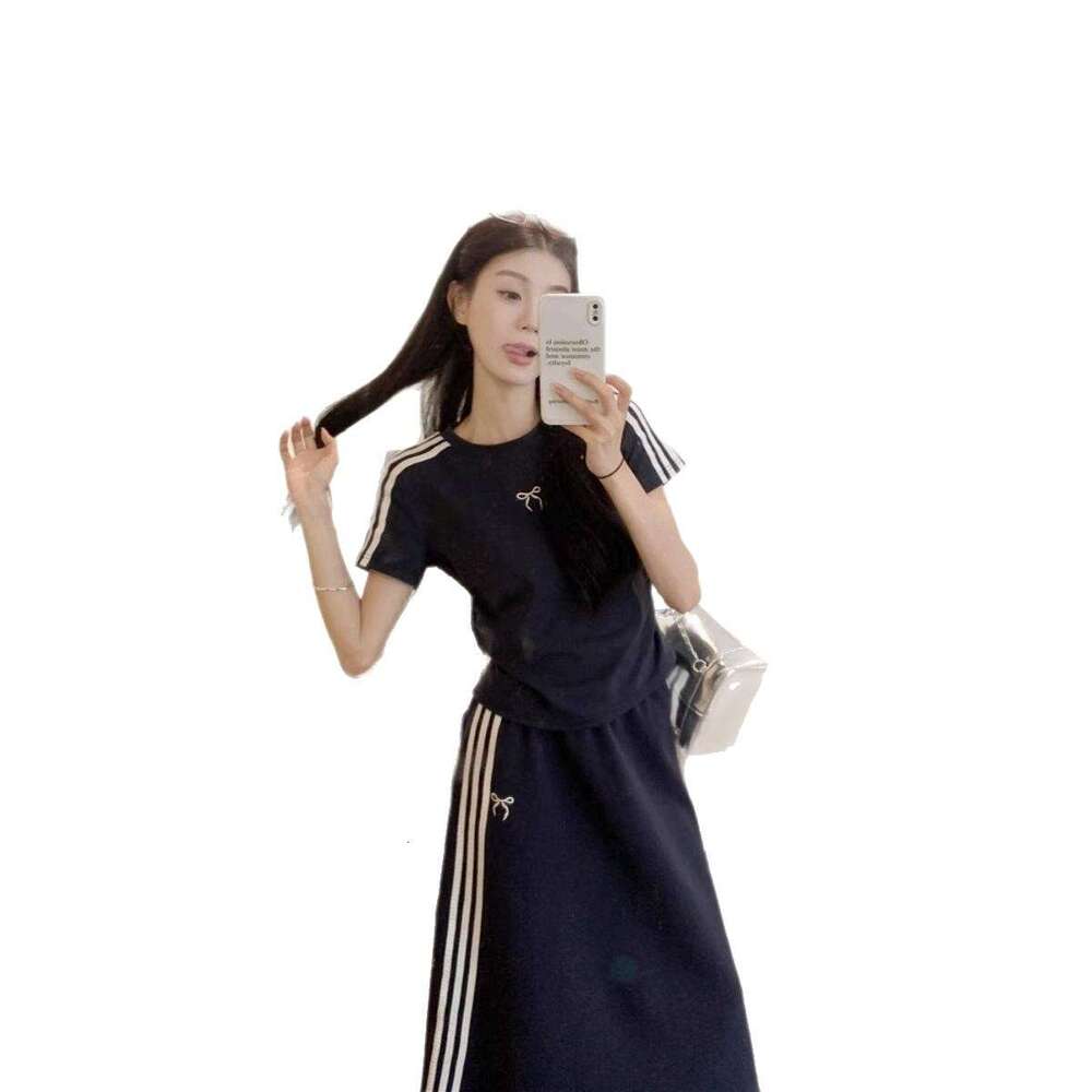 Casual Sports Set Women's Bow Short Sleeved T-shirt Spring and Summer Hip Hugging Half Length Skirt Two Piece Set