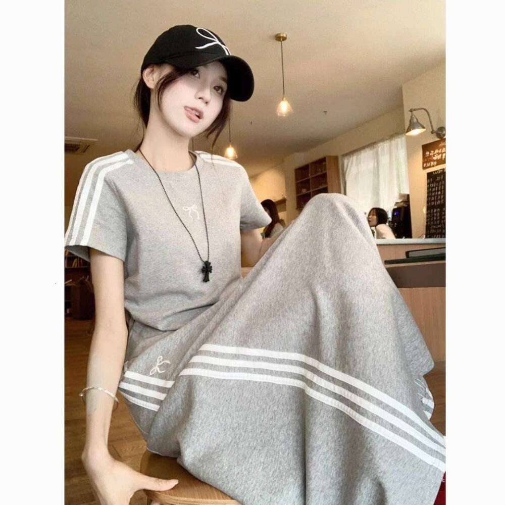 Casual Sports Set Women's Bow Short Sleeved T-shirt Spring and Summer Hip Hugging Half Length Skirt Two Piece Set