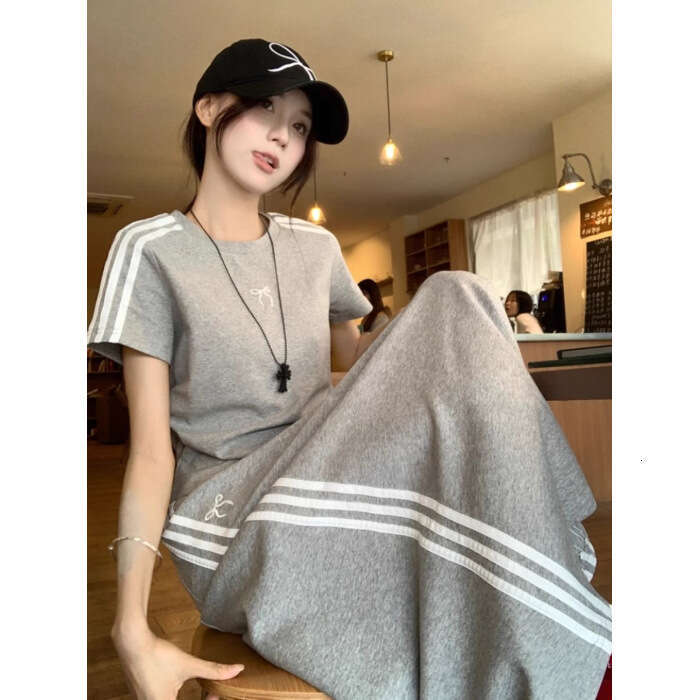 Casual Sports Set Women's Bow Short Sleeved T-shirt Spring and Summer Hip Hugging Half Length Skirt Two Piece Set