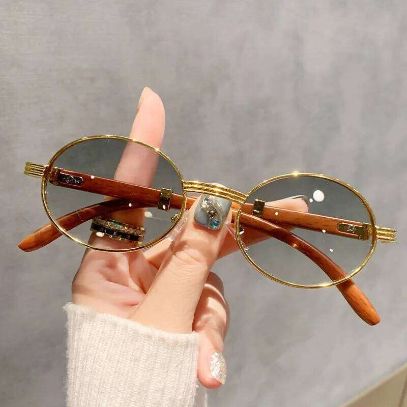 Retro oval 2026 new small frame personality Internet celebrities with the same sunglasses advanced sense 26W0224