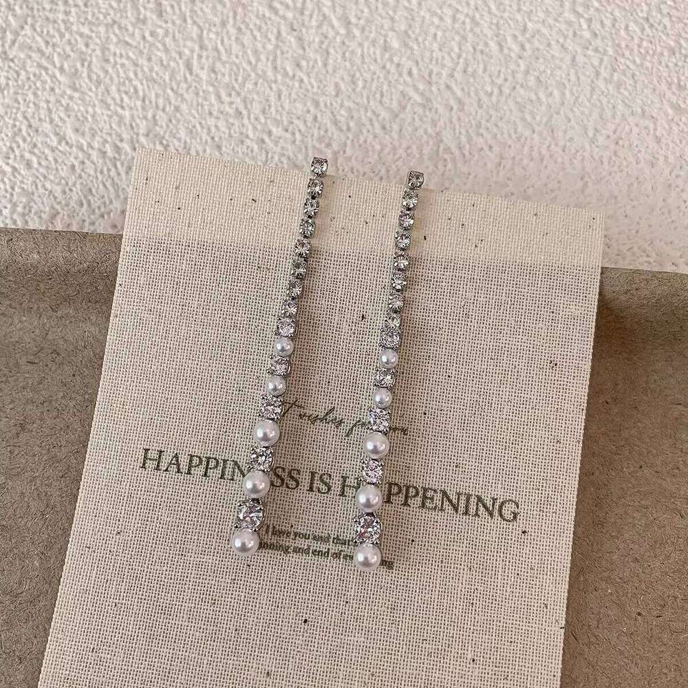 Celebrity-style geometric line long sparkling diamond and pearl tassel earrings, high-end luxury earrings