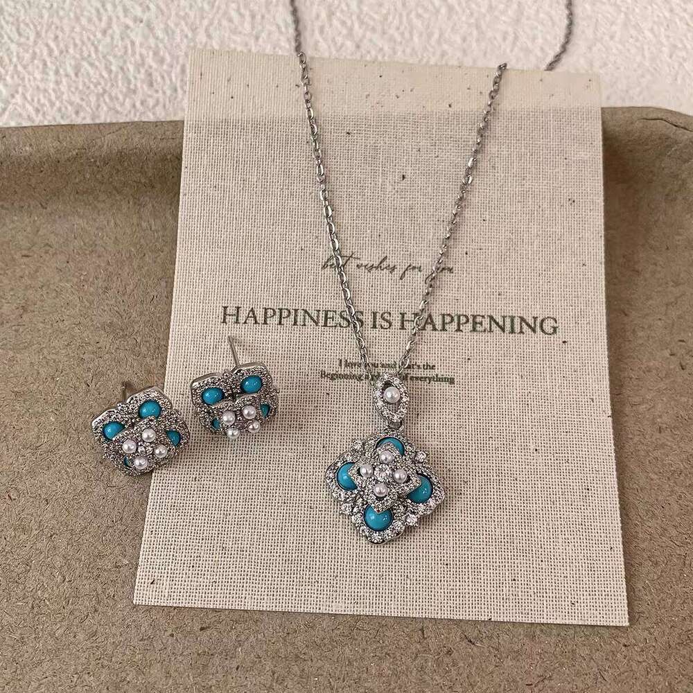 Exquisite micro-inlaid zircon turquoise four-leaf flower pearl earrings and necklace for women, fashionable niche light luxury elegant jewelry