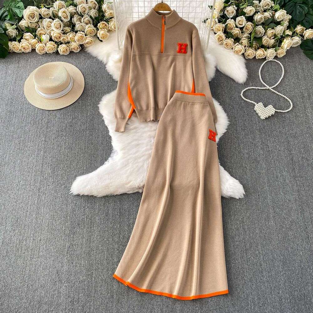 Autumn And Winter Slimming Outfit: Zippered Half-High Collar Long-Sleeve Knitted Sweatshirt + Contrasting Color High-Waisted Mid-Length Skirt Set