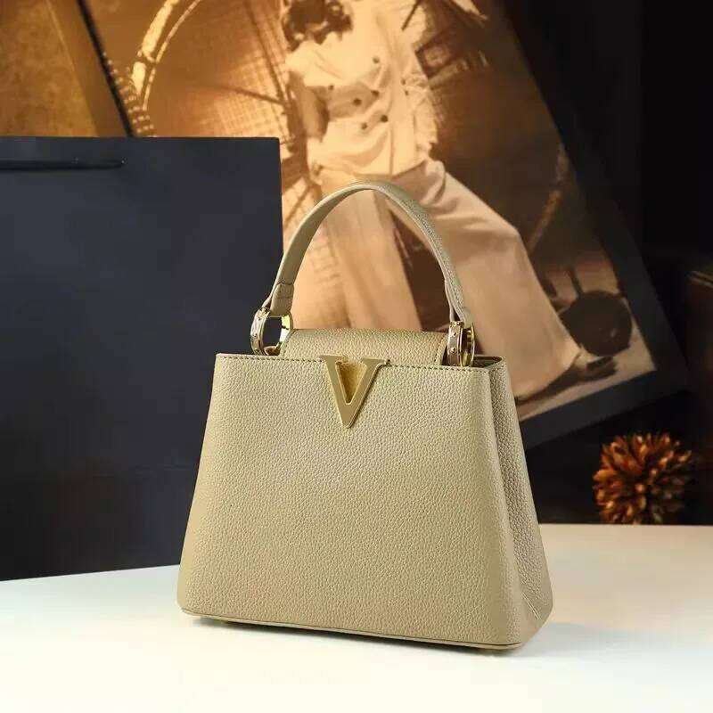 Popular High-Grade Leather Women Handbags Small Portable Bucket Bag 2025 New Niche Design Commuter Crossbody Mother Bags