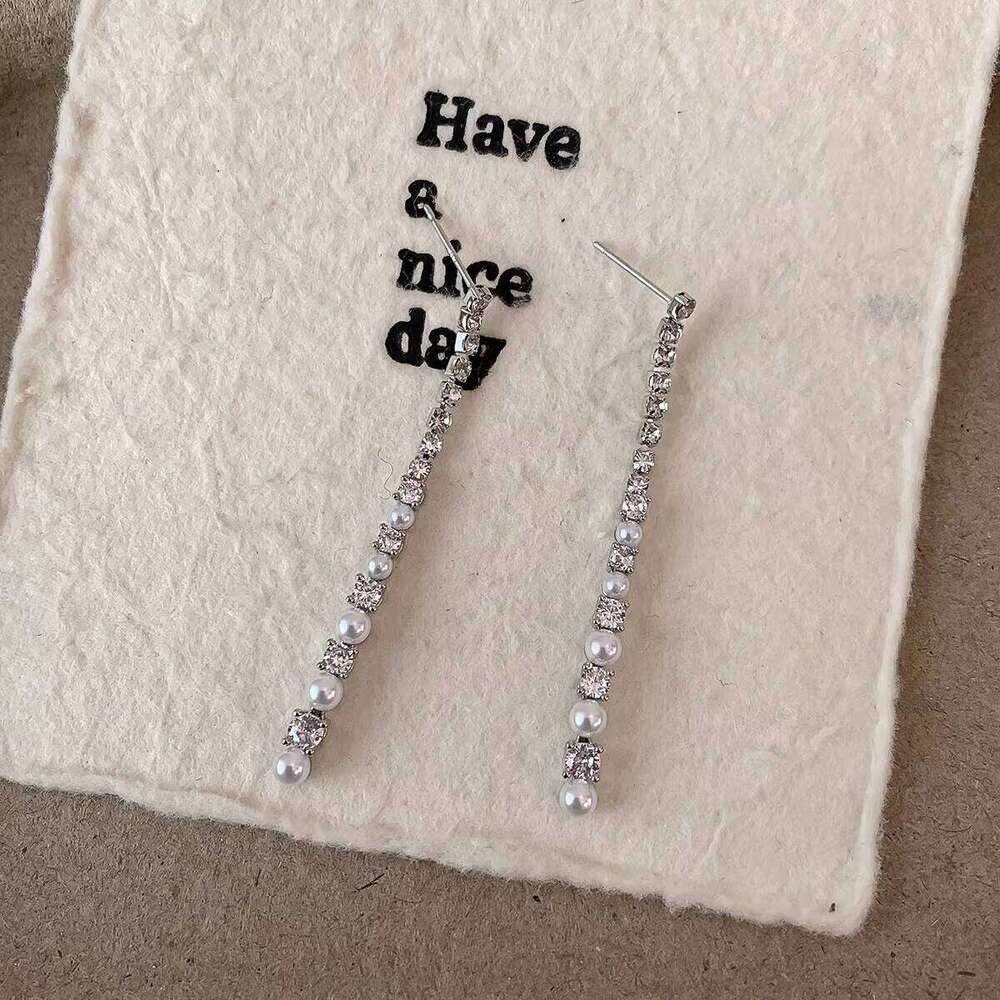 Celebrity-style geometric line long sparkling diamond and pearl tassel earrings, high-end luxury earrings