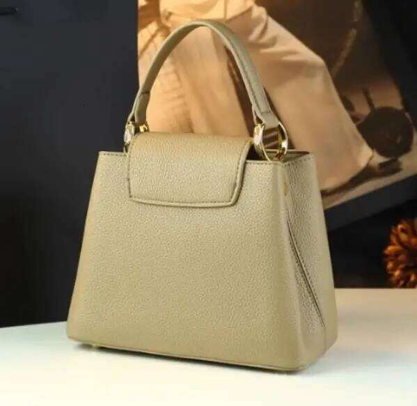 Popular High-Grade Leather Women Handbags Small Portable Bucket Bag 2025 New Niche Design Commuter Crossbody Mother Bags