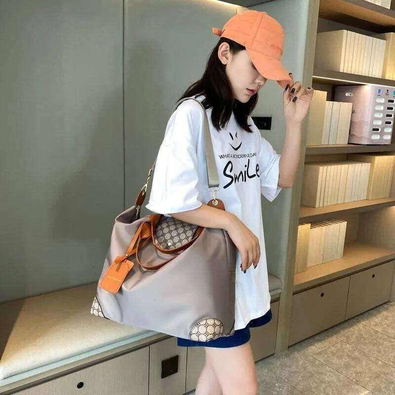 New Fitness Casual Fashion Portable Dance Large Bag Men and Women Folding Storage Swimming Business Travel Handbags Z260224