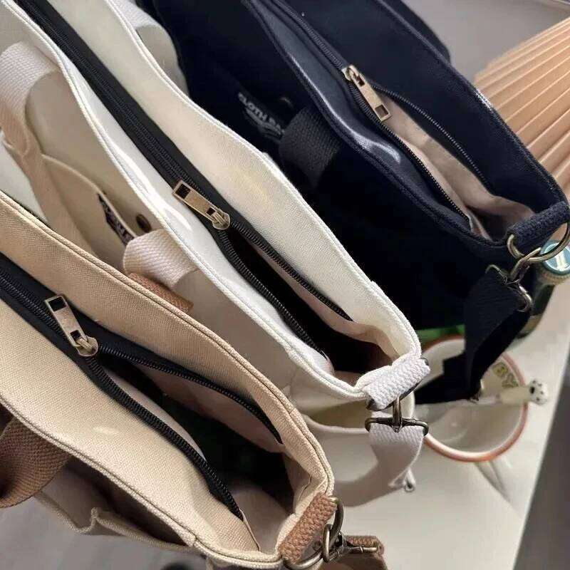 Urban Minimalist Female Student Large Capacity Commuting Horizontal Canvas Single Shoulder Diagonal Cross Portable Tote Bag Z260224
