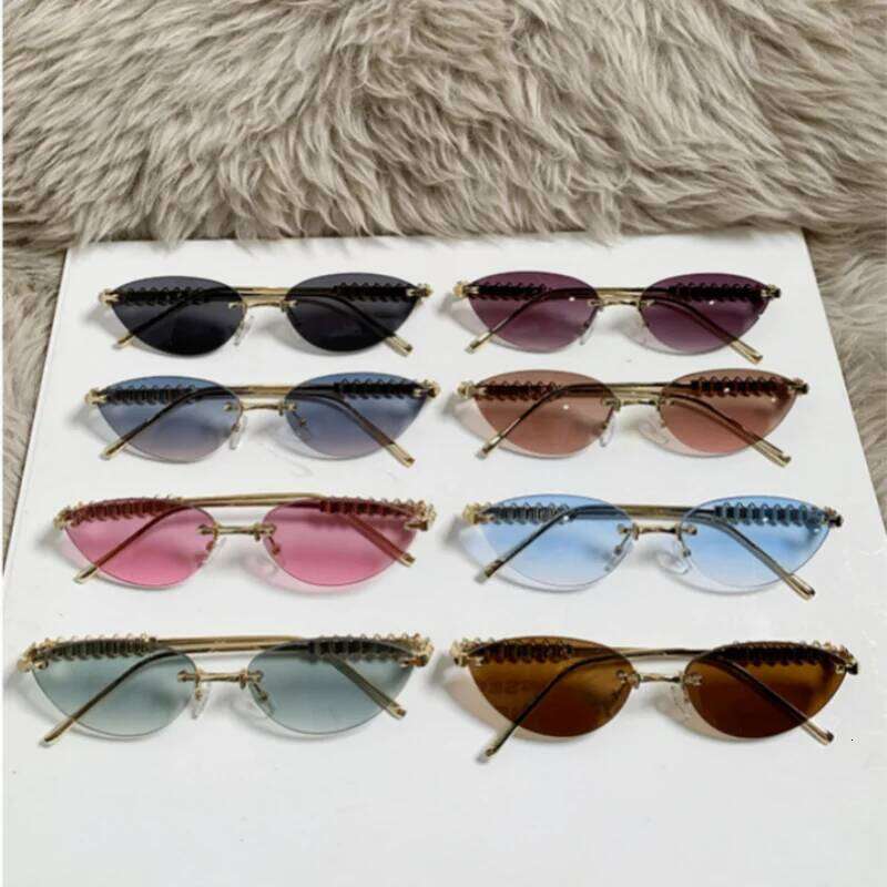 New Fashion Rimless Cat Eye Female Sunglasses High Quality Vintage Metal Frame Sun Glasses Shades UV400 Eyewear 26W0224