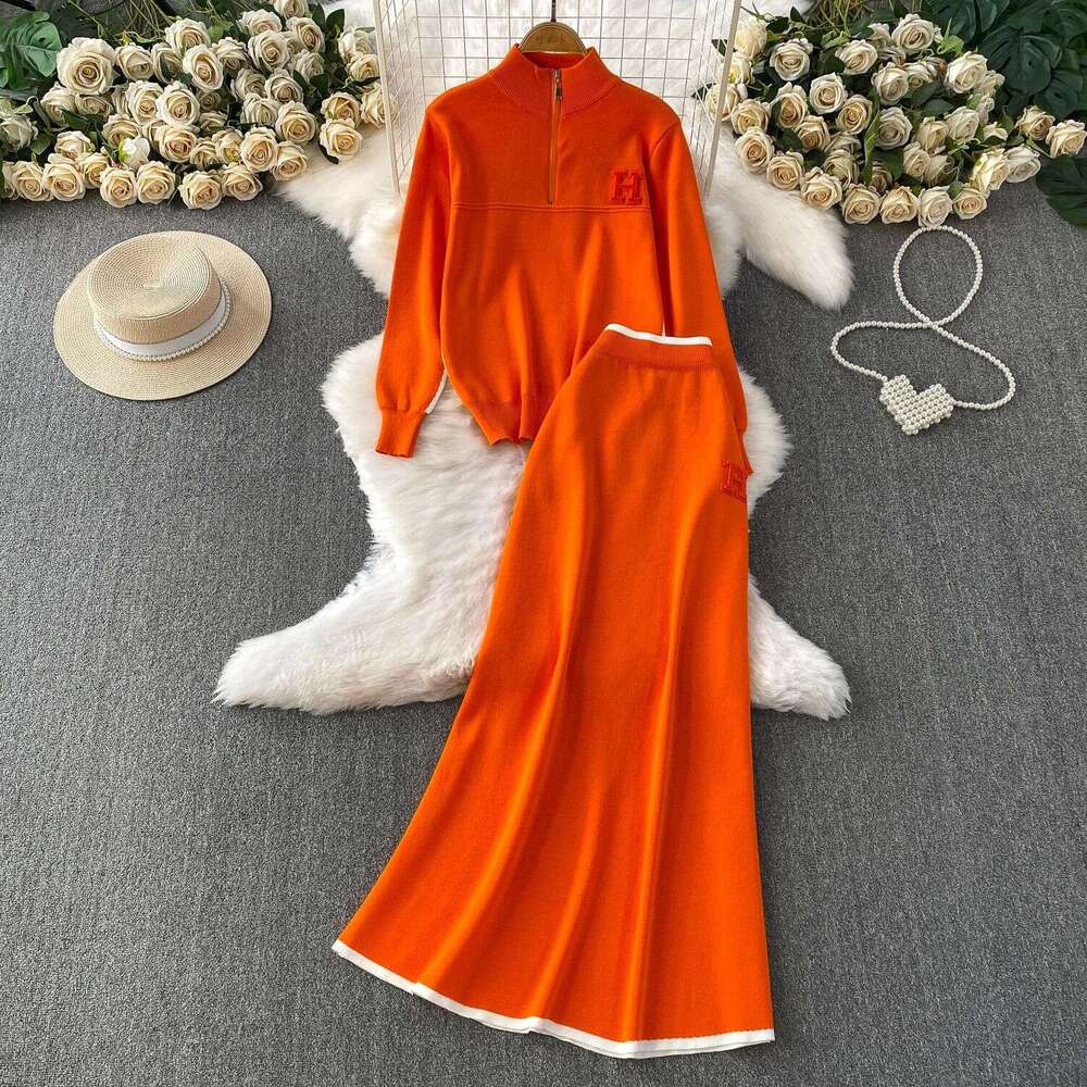 Autumn And Winter Slimming Outfit: Zippered Half-High Collar Long-Sleeve Knitted Sweatshirt + Contrasting Color High-Waisted Mid-Length Skirt Set