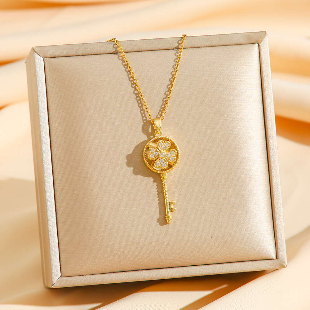 Rotating Four-Leaf Clover Key Pendant With Micro-Inlaid Zirconia Rotatable Titanium Steel Necklace For Women