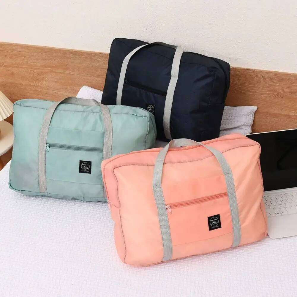 New Polyester Travel Handbag Solid Color Large Capacity Duffle Bag Foldable Waterproof Clothes Organizer Women&Men Y260225