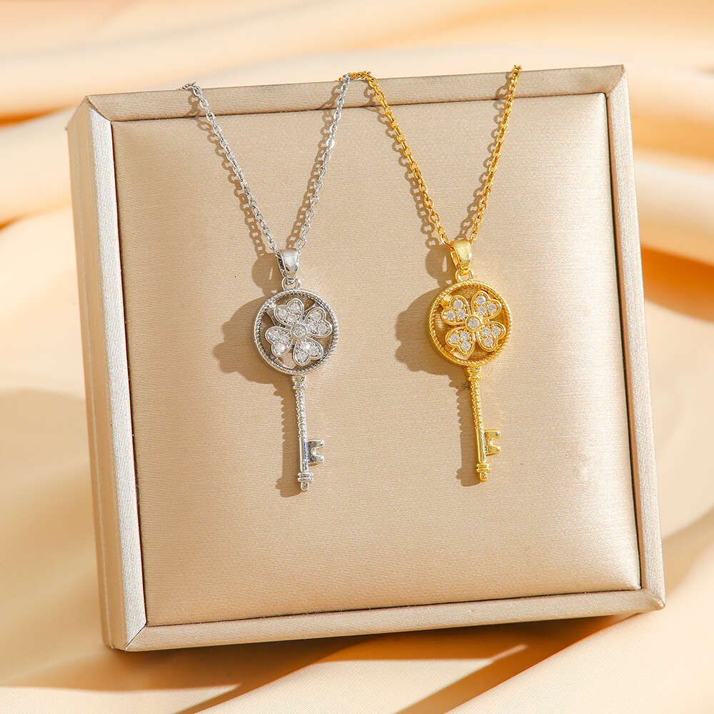 Rotating Four-Leaf Clover Key Pendant With Micro-Inlaid Zirconia Rotatable Titanium Steel Necklace For Women