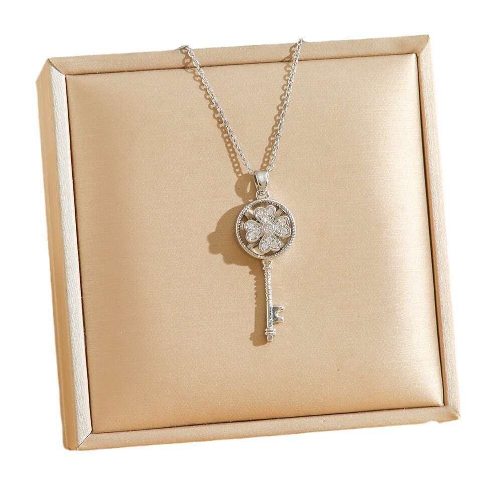 Rotating Four-Leaf Clover Key Pendant With Micro-Inlaid Zirconia Rotatable Titanium Steel Necklace For Women