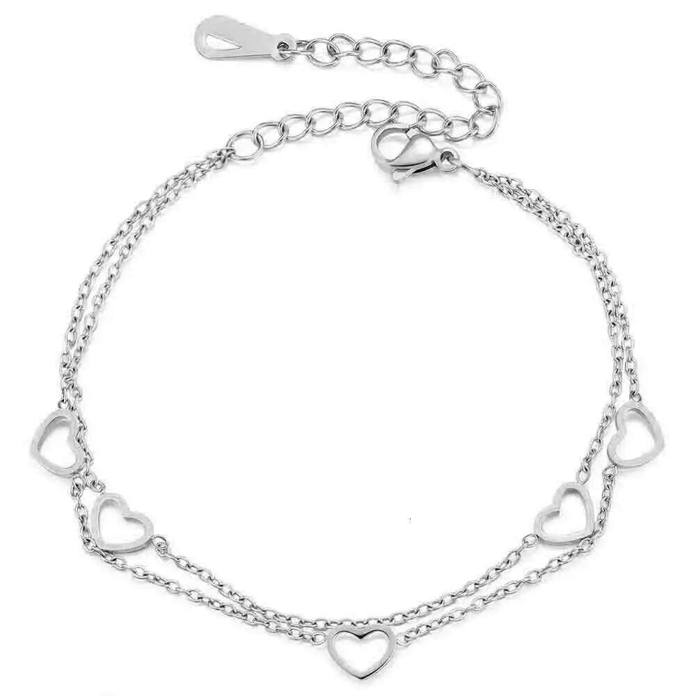 A fashionable classic stainless steel 18K gold bracelet with a hollowed-out heart-shaped chain and layered adjustment Z260225