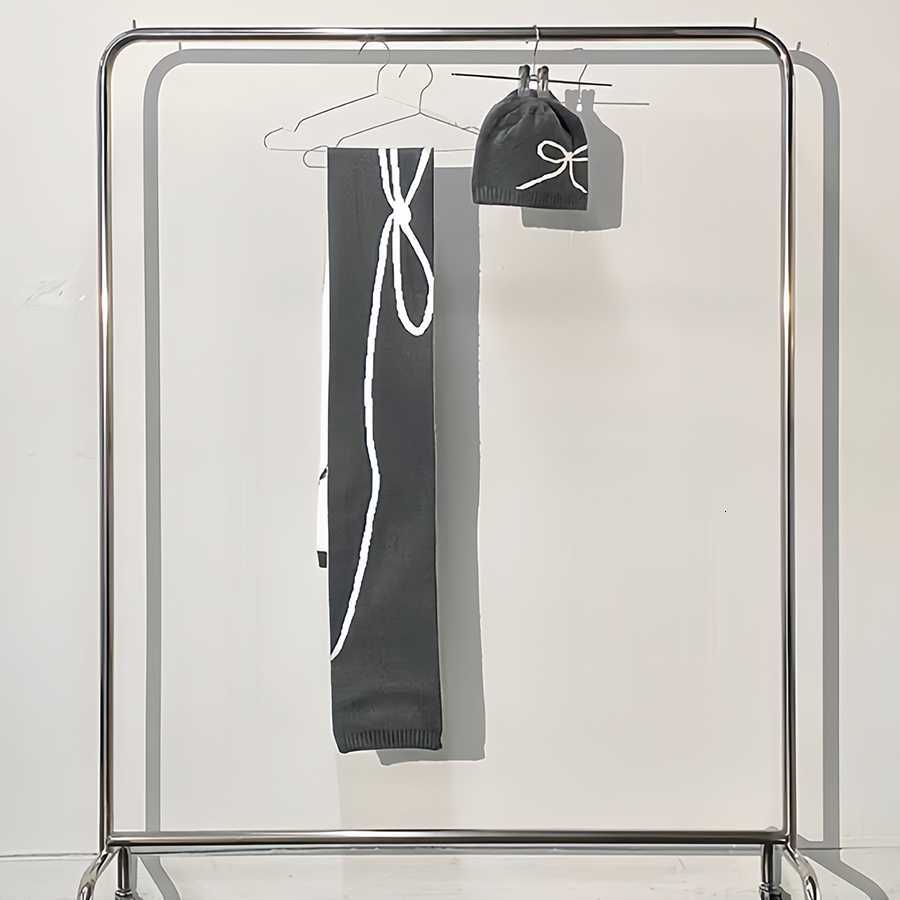 Korean bow-knot hat and scarf set two-piece autumn and winter new fashion warm knitted wool hat and neck warmer for women S260225