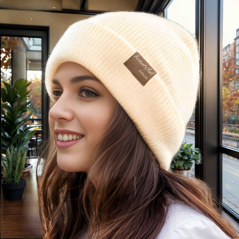 Womens autumn and winter hats are simple and with a fleece lining for added warmth thickened for warmth and include beanie hats and knitted wool hats 