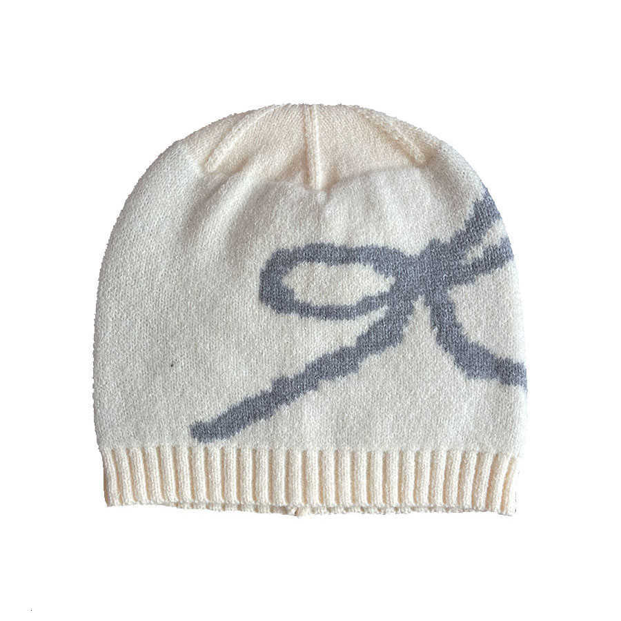 Korean bow-knot hat and scarf set two-piece autumn and winter new fashion warm knitted wool hat and neck warmer for women S260225