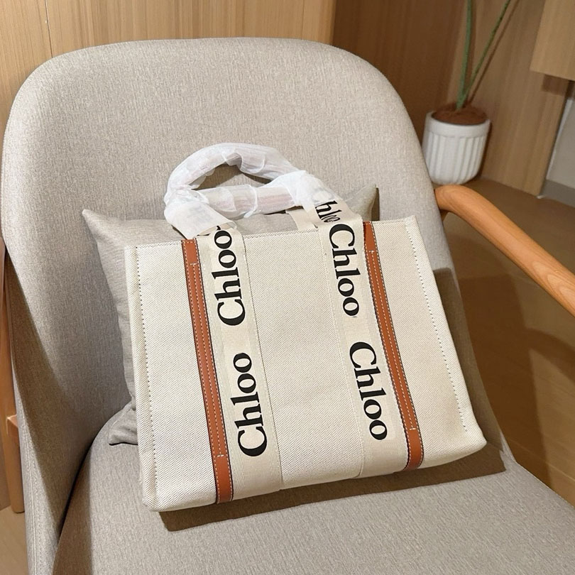 Designer Bag Tote bag handbag shopping bag Luxury CrossBody Hand Painted Lafite Grass Material Shoulder Straw beach bag Hollow woven bag Canvas Genuine Leather bag