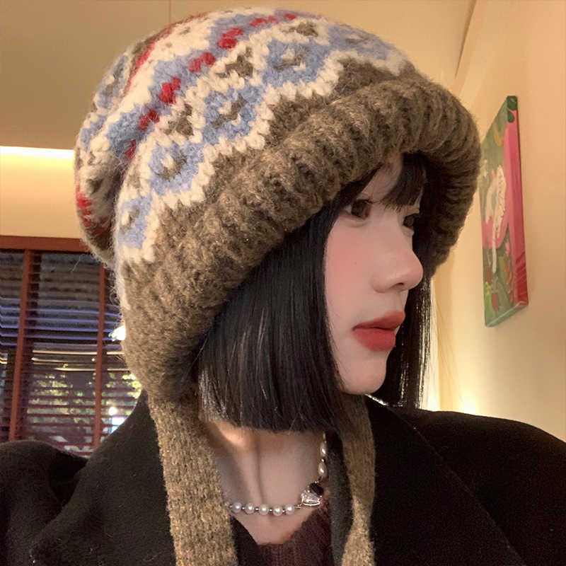 Cute Knitwear Collection------Knitted ear-protecting hat for women in autumn and winter windproof warm and makes the face look smaller plush material 