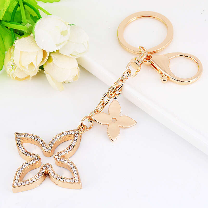 designer Unisex Keychain Versatile Double Four-leaf Flower Made Of Rose Gold Textured Metal Main Diamond-studded Outdoor Recreation
