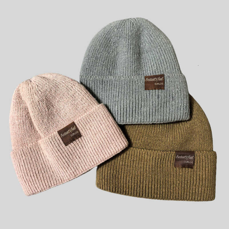 Womens autumn and winter hats are simple and with a fleece lining for added warmth thickened for warmth and include beanie hats and knitted wool hats 
