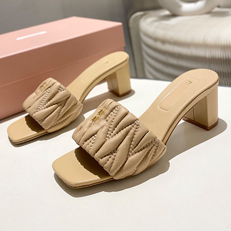 Womens Sand Beige Matelasse nappa leather slides Soft leather gold tone metal lettering logo Kitten Heel sandals classic shoe refined twist Leather sole slides