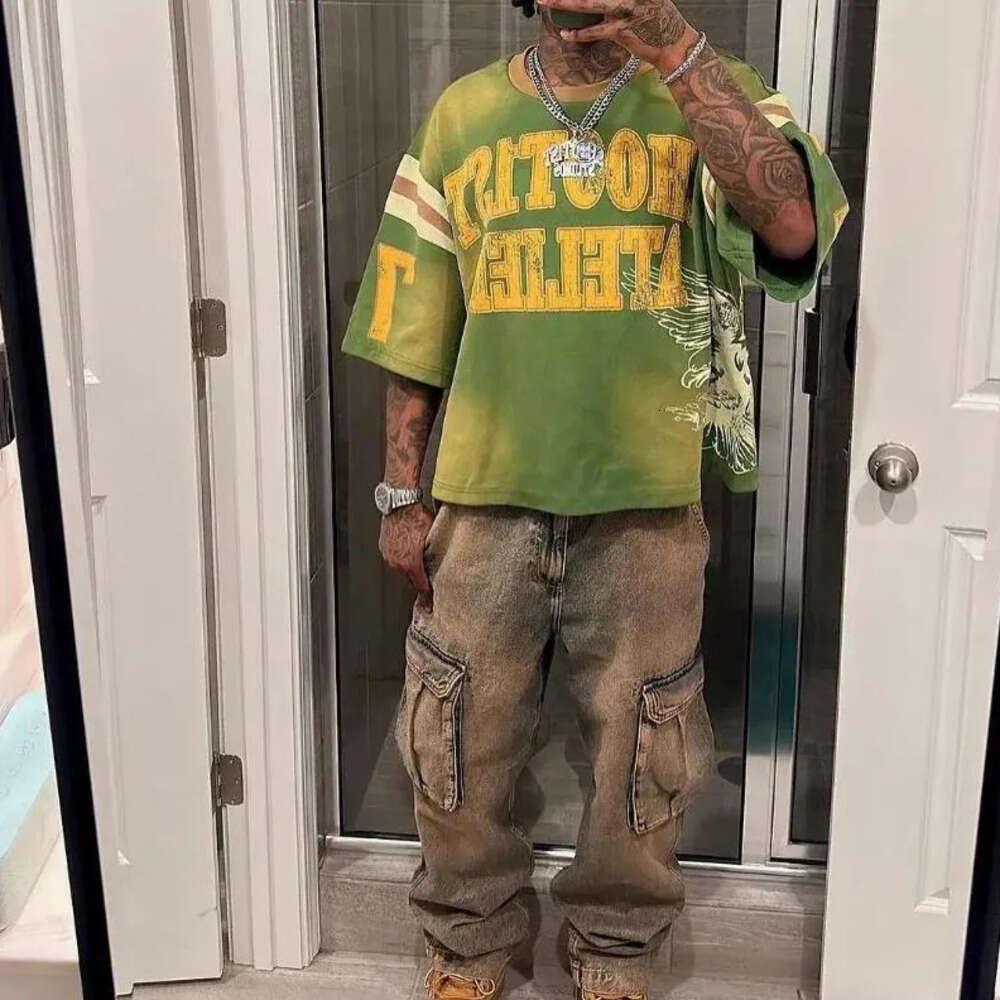 Men's T-shirt Trendy Distressed Eagle Letter Dark Green Base With Retro Yellow Letter Print Contrasting Striped Shoulder Details