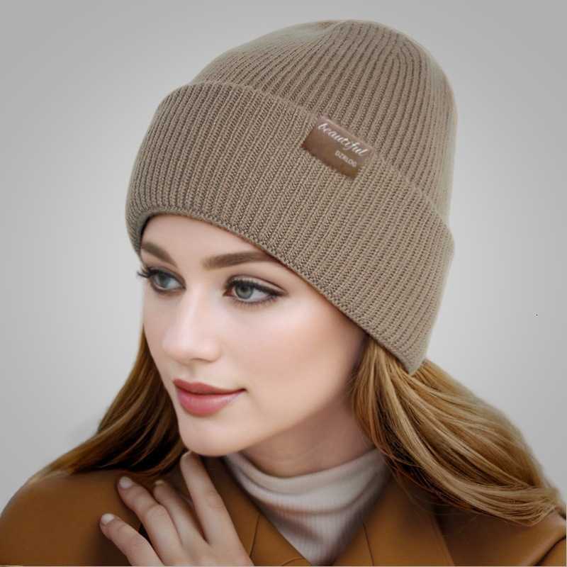 Womens autumn and winter hats are simple and with a fleece lining for added warmth thickened for warmth and include beanie hats and knitted wool hats 