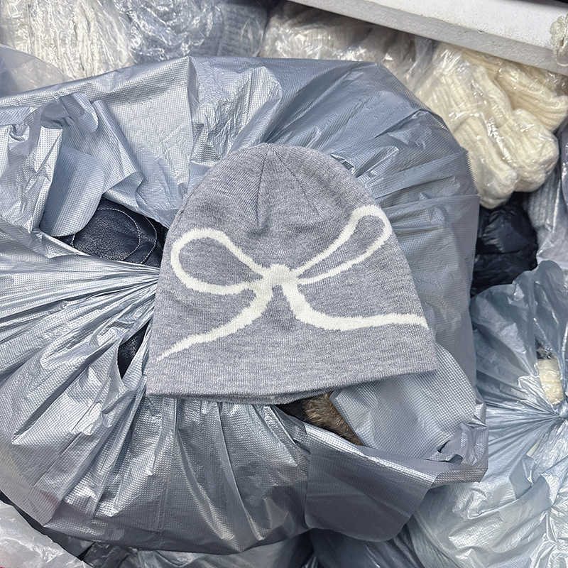 2024 New Korean Autumn/Winter Korean Style Ins Bowknot Print Knit Hat for Women Cute and Warm Cold Weather Hat S260225