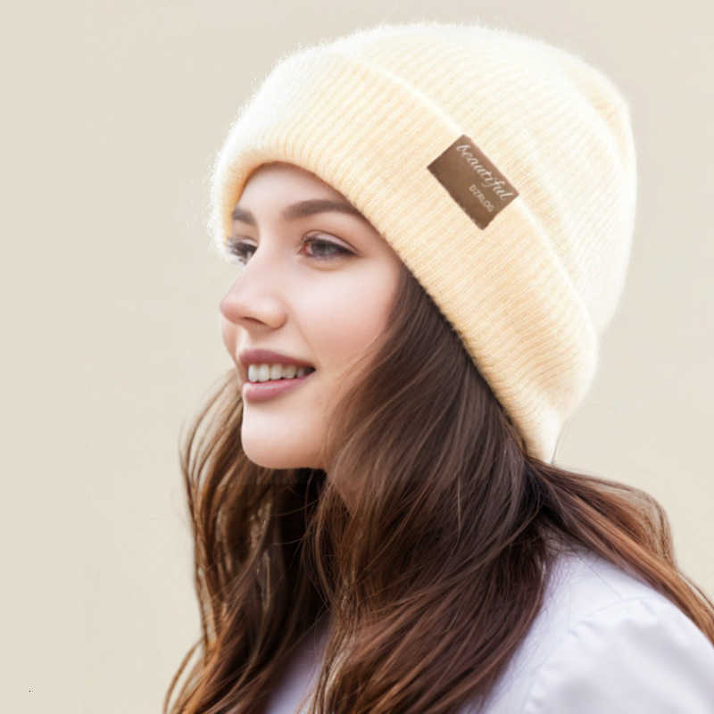 Womens autumn and winter hats are simple and with a fleece lining for added warmth thickened for warmth and include beanie hats and knitted wool hats 