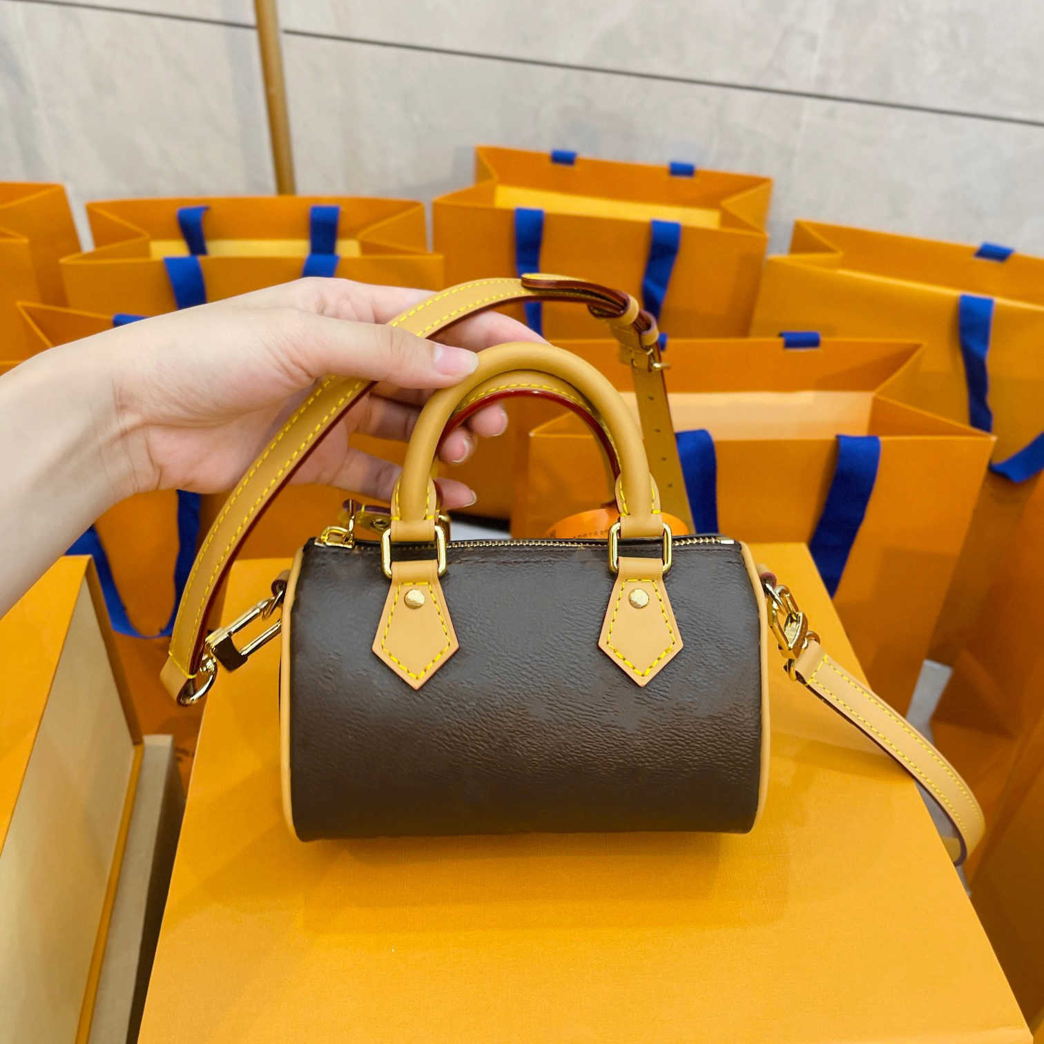 Shoulder bag Evening Bags Top Designer Mini Nano 16cm Shoulder Bag Compact and stylish Women Leather Denim Crossbody Luxury Brand Embossed Tote Brown Flower Handbag