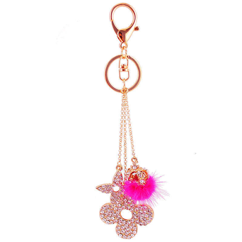 designer luxury Women's Key Ring Versatile Full-diamond Clover Bag Chain Full And Sparkling Diamonds Flexible Hollow Clover Design Jewelry
