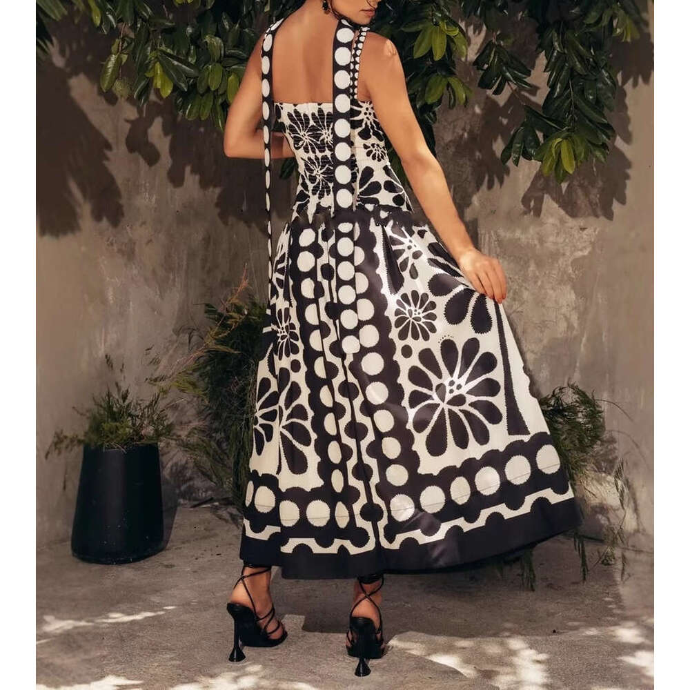 2026 spring/summer a3 European and American niche vacation style goddess temperament printed suspender long skirt paired with flowing skirt