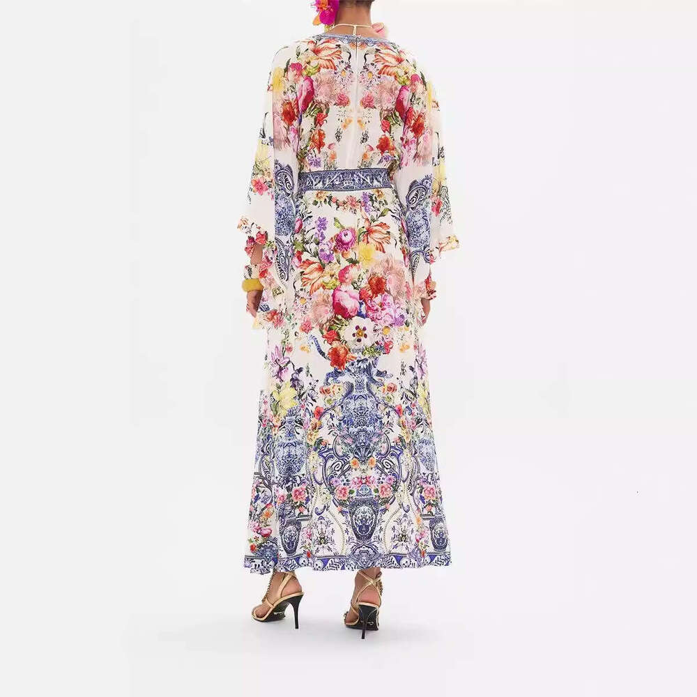 2026 autumn and winter new a3 niche fairy print V-neck bell shaped sleeves elegant goddess vacation long skirt