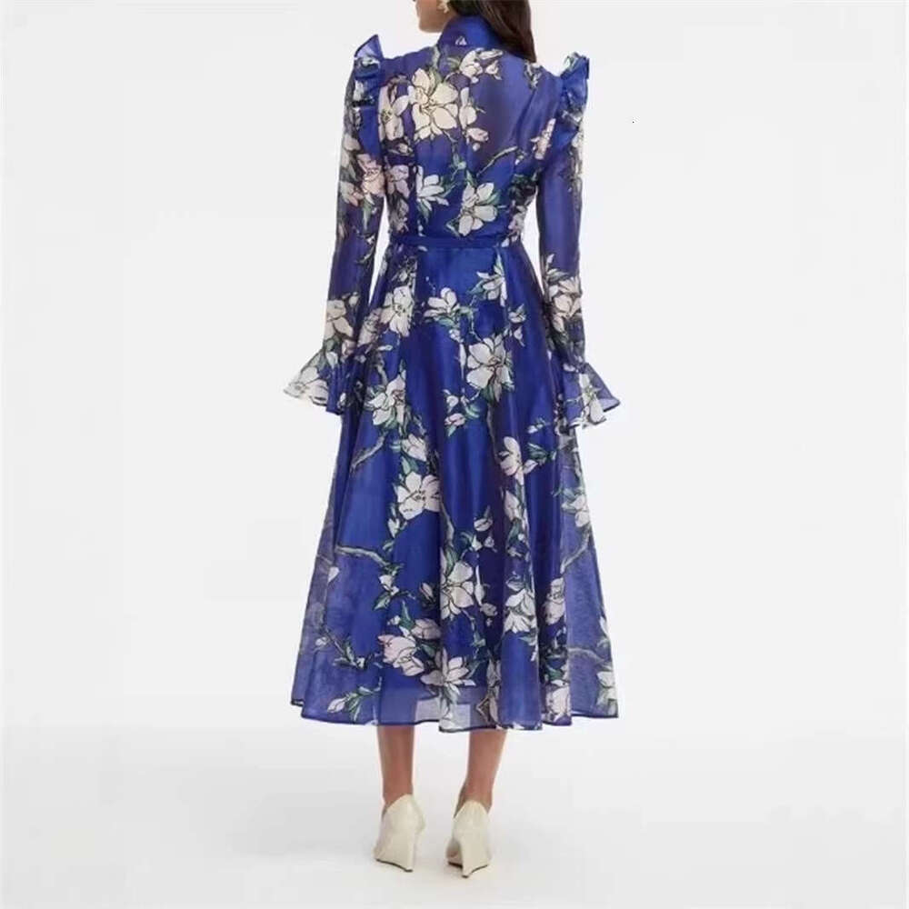 2026 early spring niche fashion design flower loose tie waist long skirt with flowing sleeves a2 and wide hem suitable for vacation