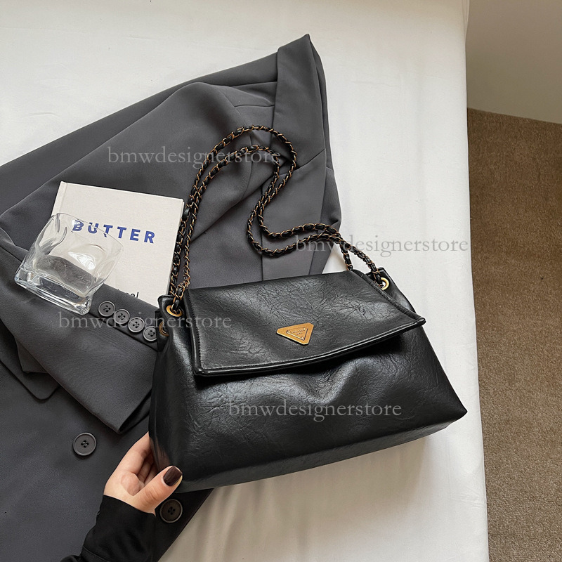 2026 Retro Luxury Women's Shoulder Bag Fashionable And Simple PU Large Capacity New Shoulder Underarm Bag Chain Strip Flip Cover Commuter Versati