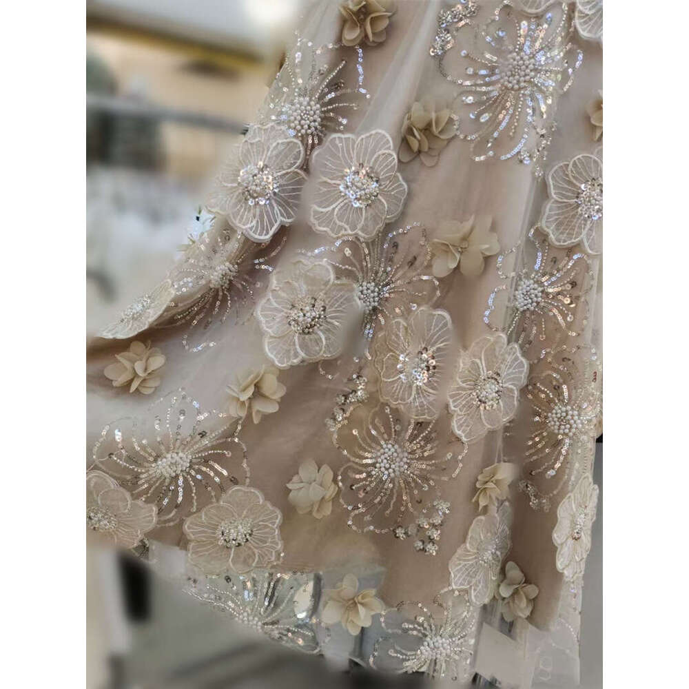 2026 luxurious and elegant dress with heavy sequin embroidery, 3D flower decals, champagne gold rhinestone
