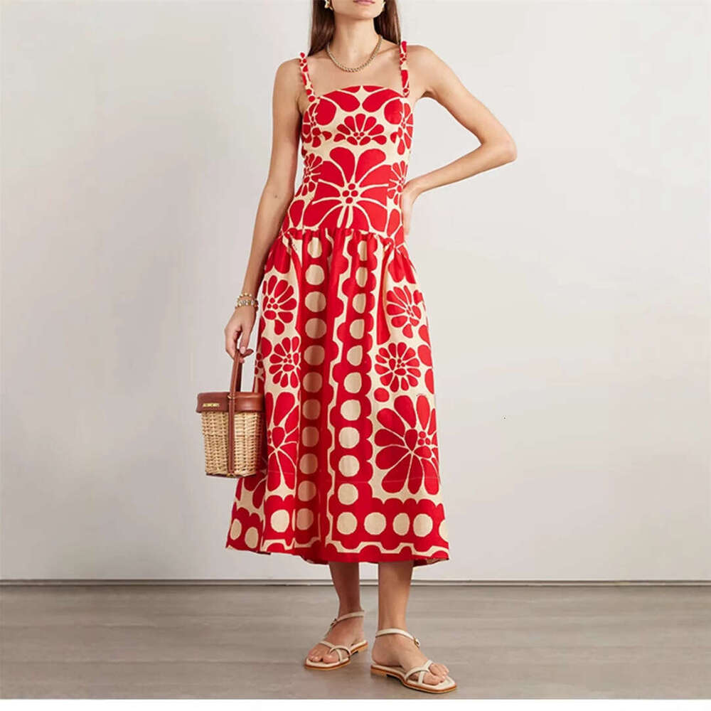2026 spring/summer European and American niche vacation style goddess temperament printed suspender long skirt paired with flowing skirt