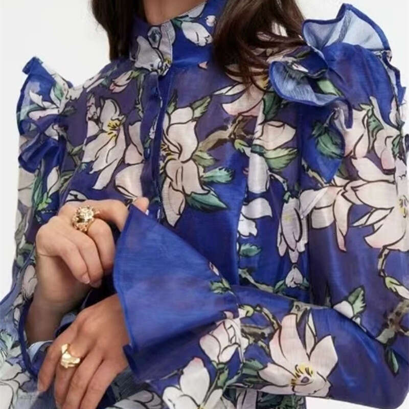 2026 early spring niche fashion design flower loose tie waist long skirt with flowing sleeves a2 and wide hem suitable for vacation