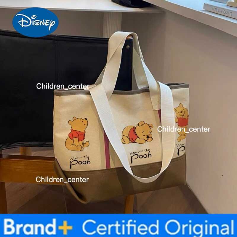 Disney 2026 New Winnie The Pooh Tote Bag For Women Fashion Canvas Shoulder Bag Ladies Casual Large Capacity Handbag H260228