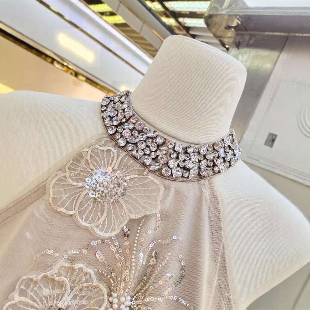 2026 luxurious and elegant dress with heavy sequin embroidery, 3D flower decals, champagne gold rhinestone