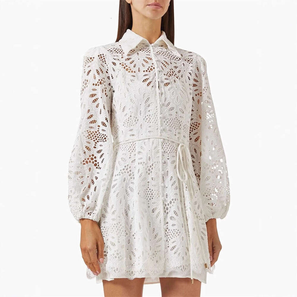 2026 early spring new designer fashionable and A1 elegant women's hollow solid color lace loose tie short skirt