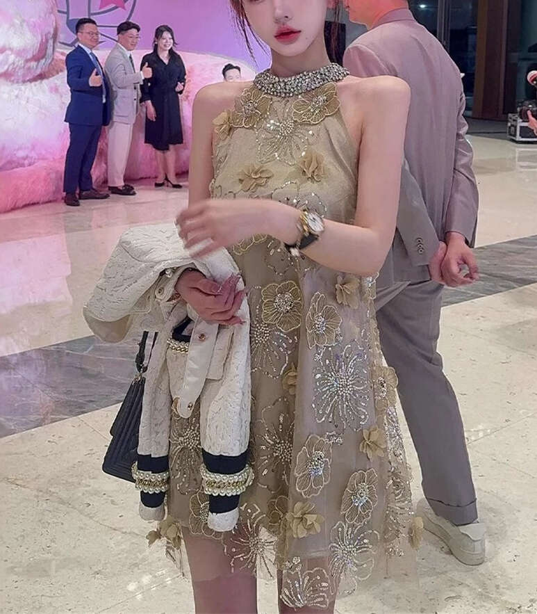 2026 luxurious and elegant dress with heavy sequin embroidery, 3D flower decals, champagne gold rhinestone