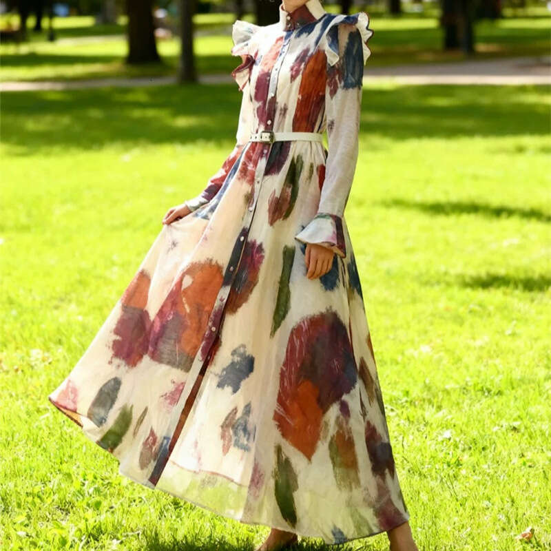 2026 early spring niche fashion design flower loose tie waist long skirt with flowing sleeves a2 and wide hem suitable for vacation