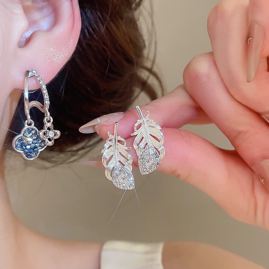 Silver needle with crushed diamonds, feathers, flowers, exquisite fashionable niche design earrings, light luxury and high-end beautiful earrings - view 3